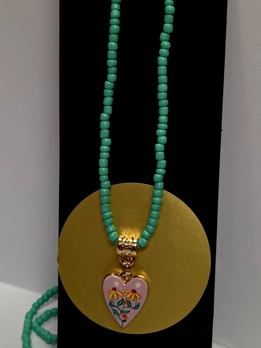 Heart Pendant Beaded Necklace in Turquoise with Floral Enamel Charm